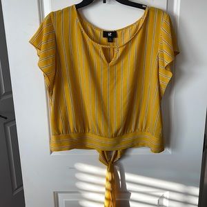 Cute yellow striped blouse, with a cute wrap around tie